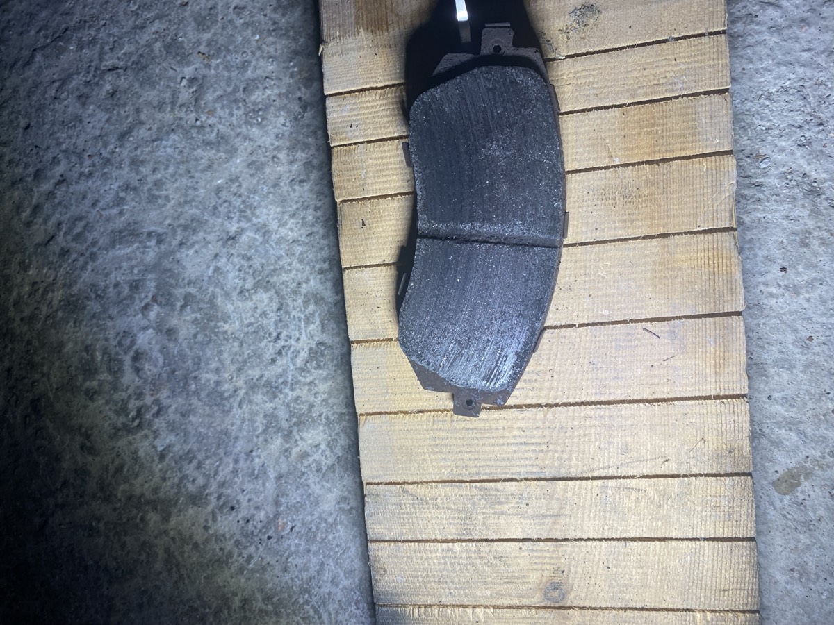 Heavily worn EBC YellowStuff pad, friction material nearly gone