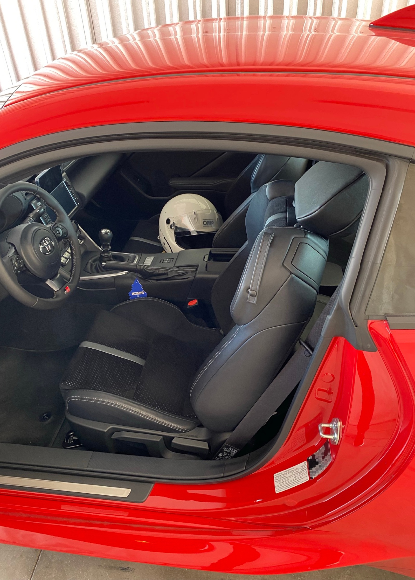 GR86 interior with racing helmet on seat