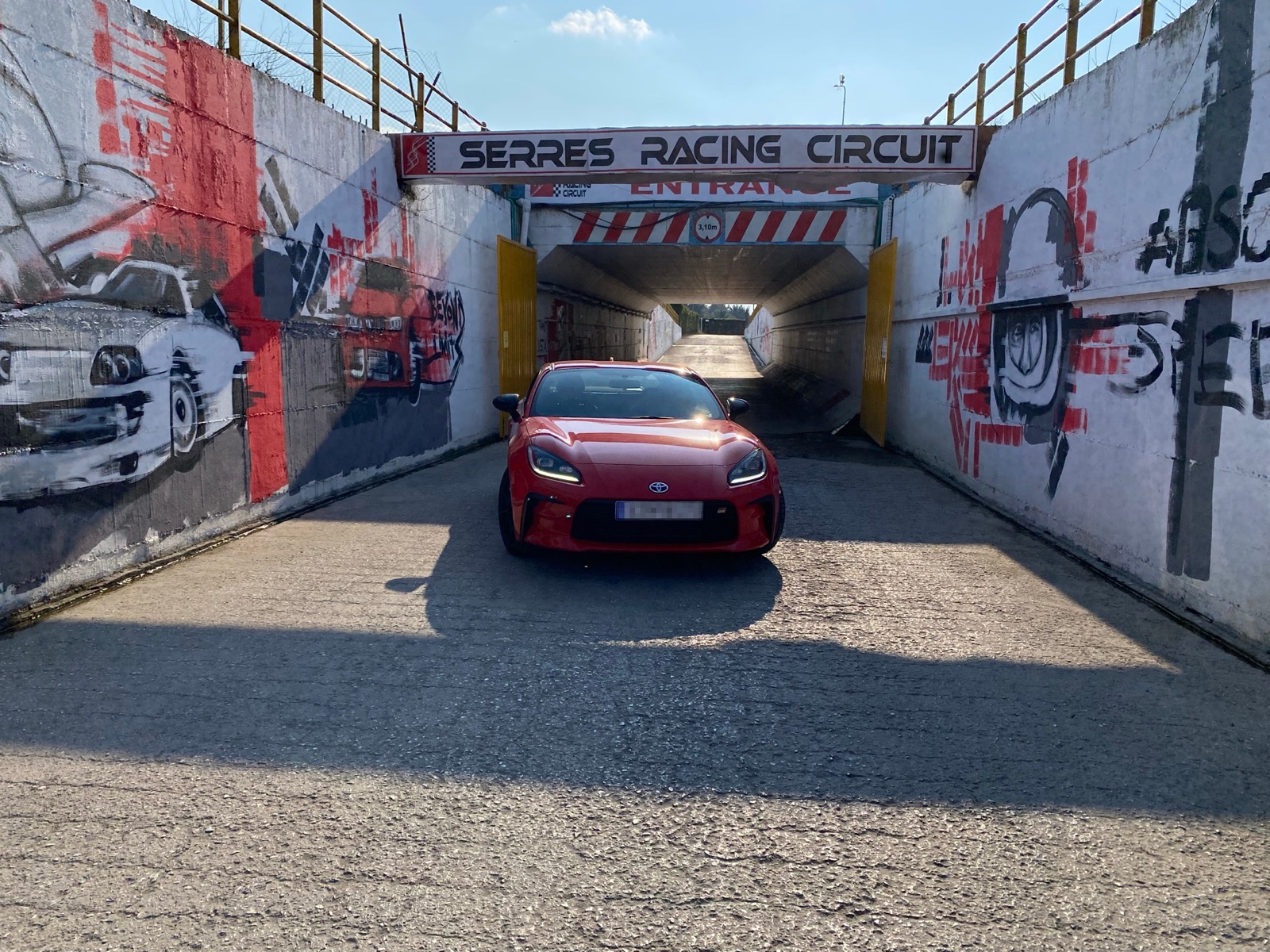 GR86 at the Serres Racing Circuit entrance tunnel